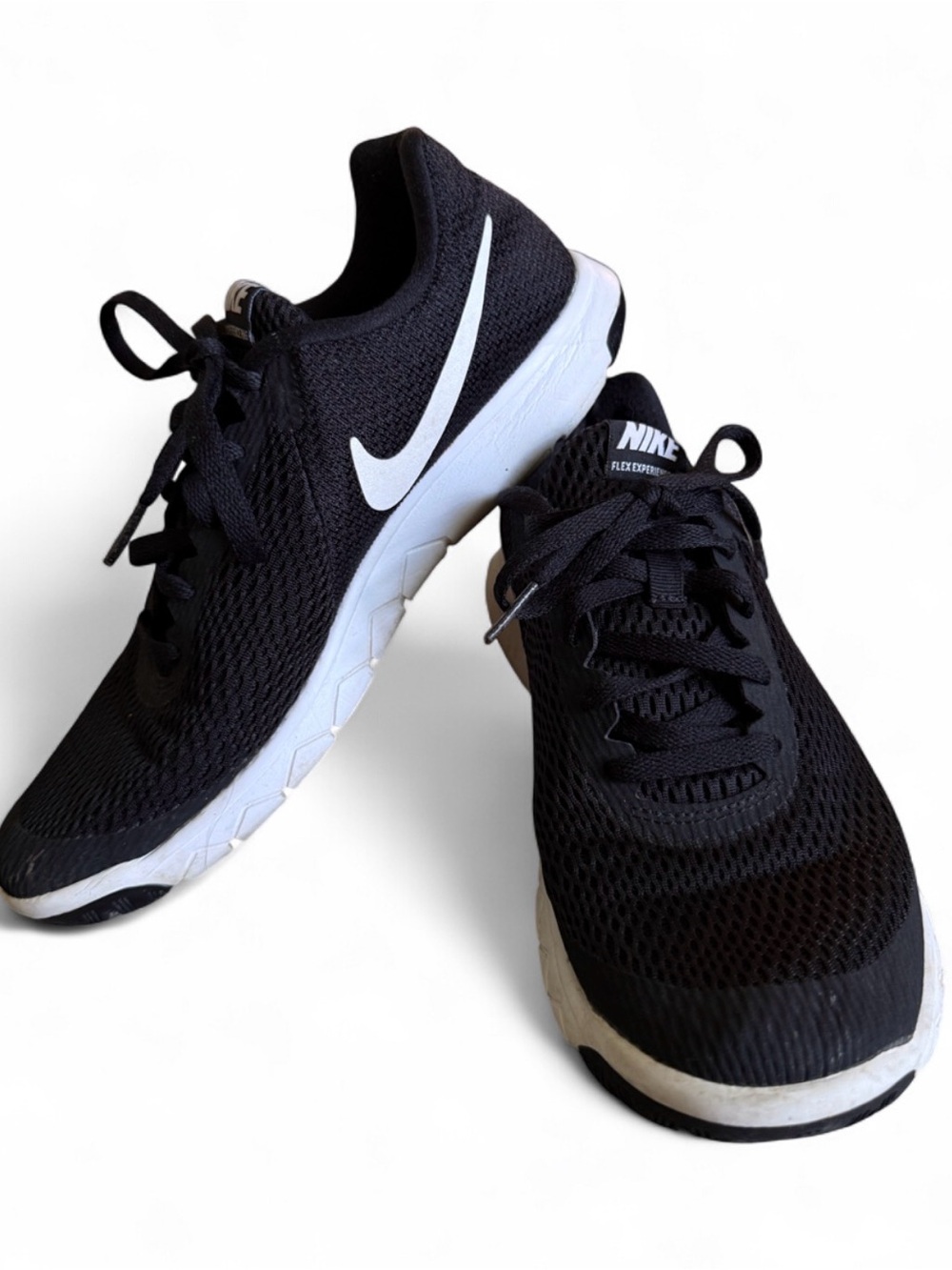 Nike Woman’s Black Athletic Running Shoes with White Swoosh